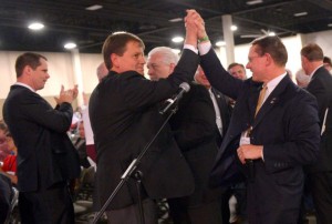 (Leah Hogsten | The Salt Lake Tribune) Rep. Ken Ivory, R-West Jordan (right) high-fives Rep. Kevin Stratton, R-Orem (left) after Ivory's resolution to demand the federal government transfer control of oil-, timber -and mineral-rich lands to western states passed at the Utah Republican Party 2014 Nominating Convention at the South Towne Expo Center, Saturday, April 26, 2014.